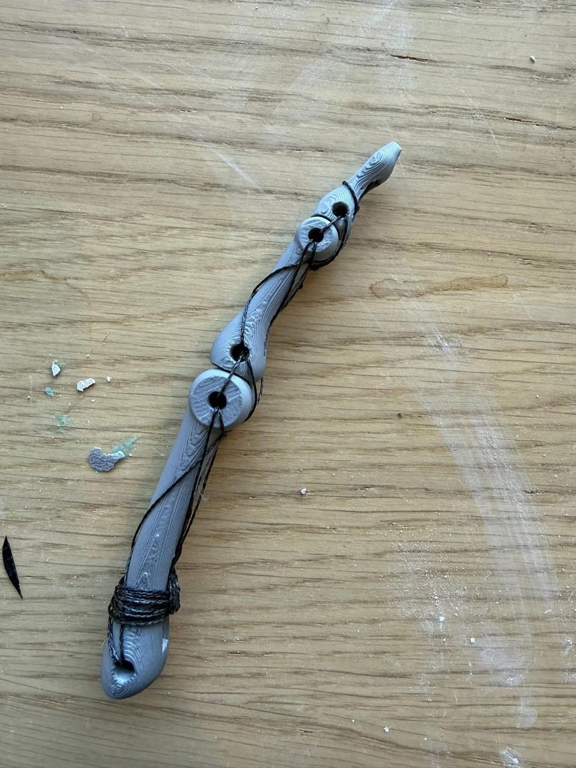 3D printed bone with tendon thread